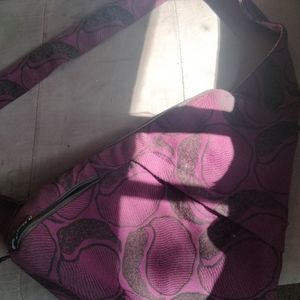 Maruca sling purse.purple and black.